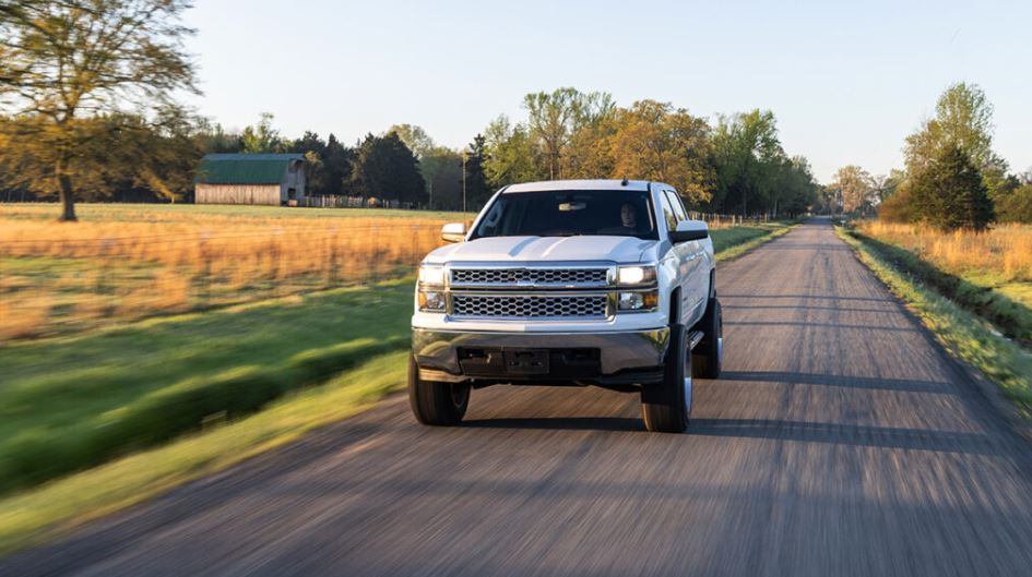 A car driving on a country road
