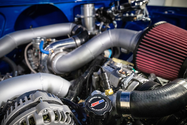 Amsoil vehicle engine close-up to test engine compression